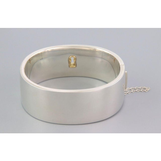 Contemporary Mid 20th Century Tiffany & Co Sterling & 18k Gold Wide Key Lock Bangle Bracelet For Sale - Image 3 of 6