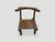 Hand carved wooden chair from the Ivory Coast of Africa. This can also be used as a low side table. A piece of art. This...