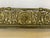 Fine Antique Lions Head Brass Fireplace Fender with Acorn Finials in good estate condition. It has an ornate, pierced...
