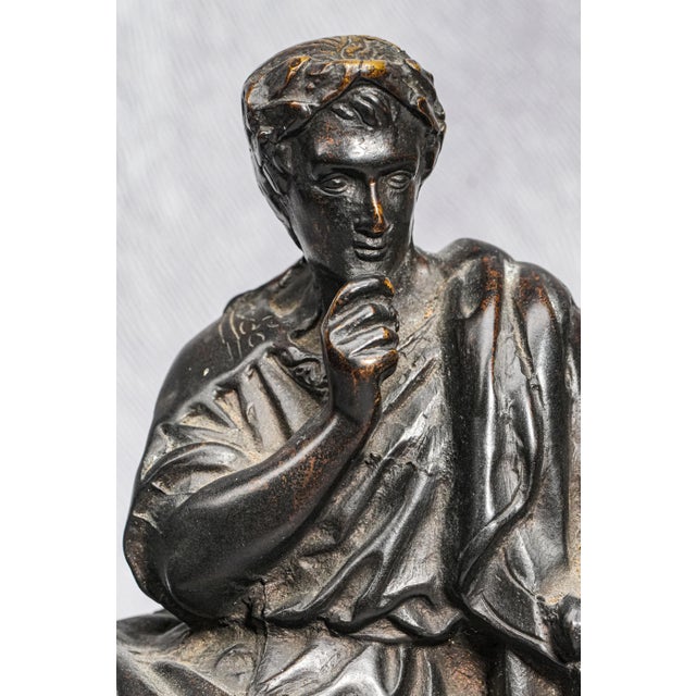 This impressive Victorian-era bronze sculpture, dating to the 1870s or 1880s, captures the timeless image of a seated...