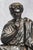 This impressive Victorian-era bronze sculpture, dating to the 1870s or 1880s, captures the timeless image of a seated...