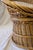 Woven Wicker Armchair – 1970s Crafted entirely in natural woven wicker, complete with a removable raffia cushion. Seat...