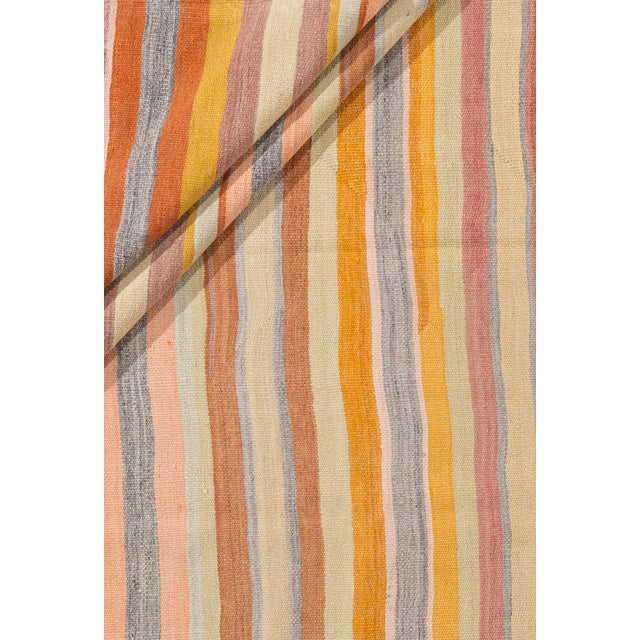This vintage Turkish flat weave Kilim is hand-woven. The simplicity and boldness of this piece can also give a...