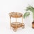 Stunning French Riviera style round serving bar cart entirely crafted in bamboo, curved rattan, and hand-woven wicker....