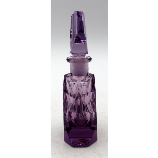 Amethyst glass perfume bottle with original dauber, circa 1920s. Art Deco. Marked "Made in Czechoslovakia" with insignia...