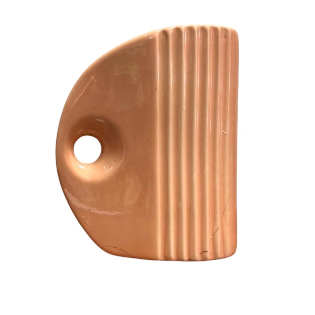 A striking vintage ceramic vase that blends the streamlined geometry of Art Deco with the sculptural sensibility of Mid-...