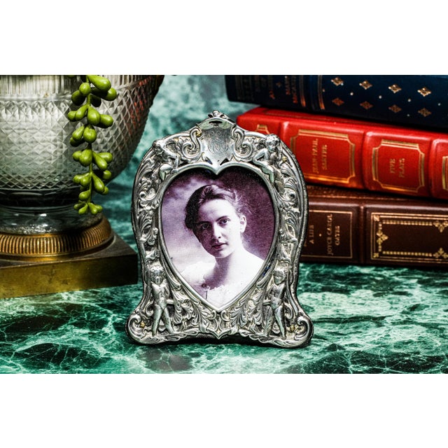 Add a touch of romantic Victorian charm to your décor with this lovely antique heart-shaped picture frame, beautifully...