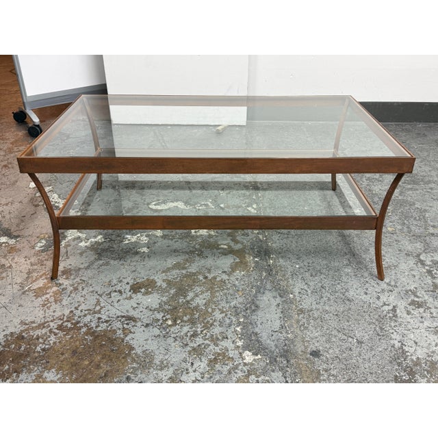 Design Plus Gallery presents a Luna Two-Tier Glass Coffee Table from Crate & Barrel. This design has a rectangular metal...