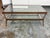 Design Plus Gallery presents a Luna Two-Tier Glass Coffee Table from Crate & Barrel. This design has a rectangular metal...
