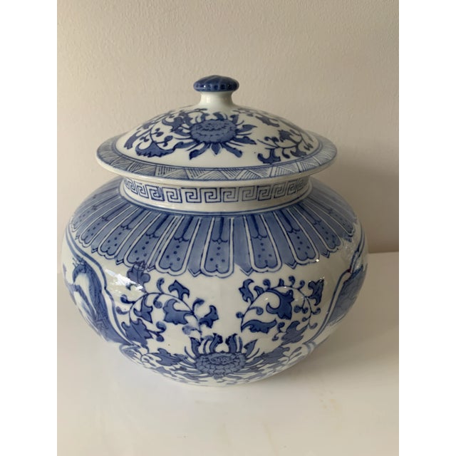 Mid 20th Century Chinese Blue and White Floral & Landscape Porcelain Lidded Urn For Sale - Image 4 of 11