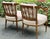 Beautiful pair of Louis XVI armchairs with elegant fluted legs with carved detail, upholstered back and seat cushions,...