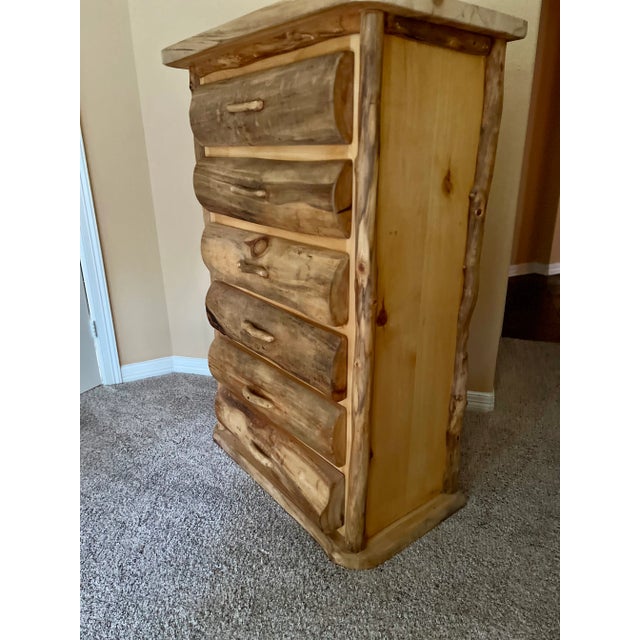 This is a solid wood Aspen log chest with beautifully designed gnarly drawer fronts. Each drawer measures 27" width x...