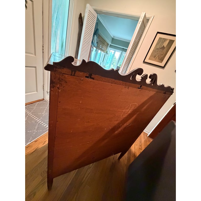 An exceptional piece of American craftsmanship! This genuine antique 4-drawer dresser was made by The White Furniture...