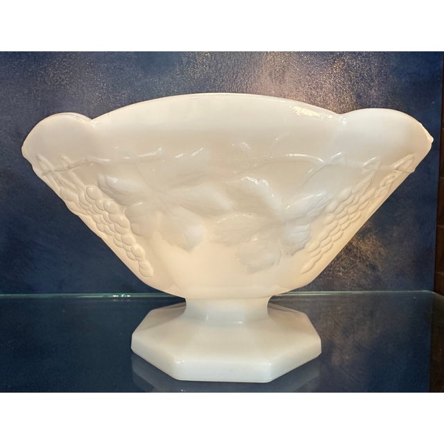 Mid 20th Century Footed Opalescent Milk Glass Bowl by Anchor Hocking. Grapes and leaves decorate each panel with an 8...