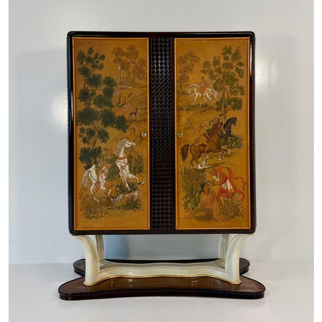 Rare Italian bar cabinet produced in the 1940s, attributable to the design of Gio Ponti and enriched by two extraordinary...