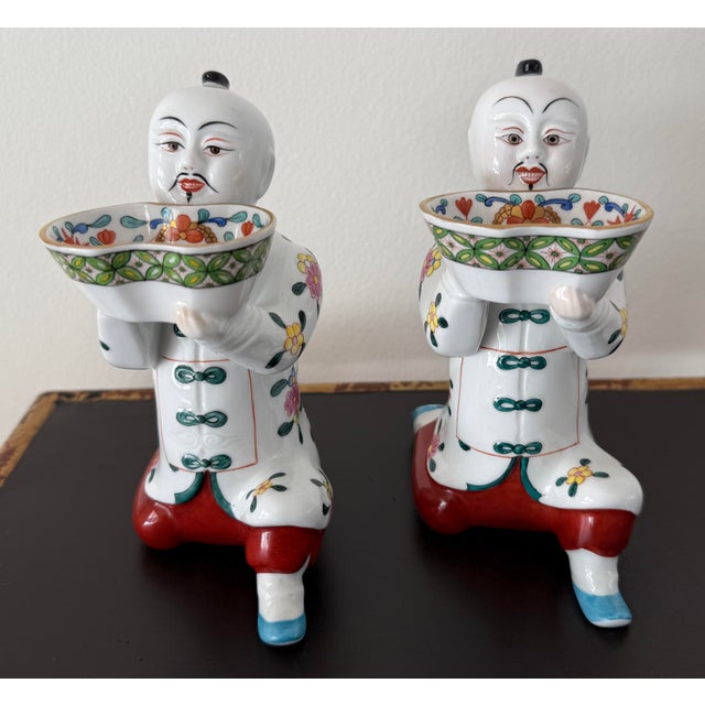 Herend kneeling Asian man salt cellars. These are the largest size, 6.5" In height. Porcelain from Hungary, handmade and...