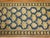A very long early 20th century Russian Karabagh runner featuring accents in black, blue, gold and rust. The border is...