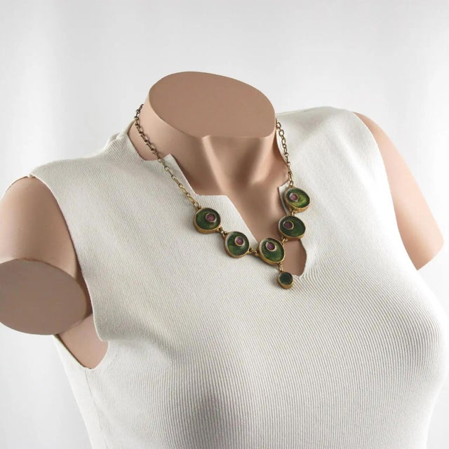 This stunning French modernist bronze choker necklace features five geometric dangling charm elements in rounded free...