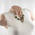 This stunning French modernist bronze choker necklace features five geometric dangling charm elements in rounded free...