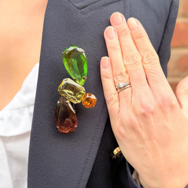 This sculptural multi-coloured brooch was created in Italy by Giorgio Armani in the 1990s. Condition Report: Excellent The...