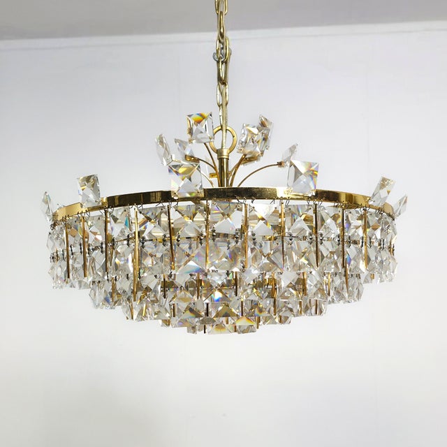 Mid-Century Brutalist Clear Crystal and Brass Chandelier from Palwa, 1970s, in Very Good conditions. Designed 1970 to 1979...