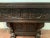 Rustic carved oak console table carved front decorated with mermaids and foliage small storage hatch base decorated with a...