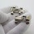 A vintage set composed of two miniature racing cars, handcrafted in Continental Silver (800/000) in Italy between the...