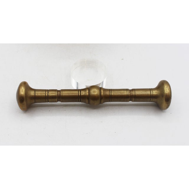 Late 19th century brass mortar & pestle, European. Likely Scandinavian or Germanic countries. Rings incised on interior &...