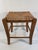 A charming and functional handwoven French Rush "Paille" (straw) 18.5" Stool, made in France. Circa Mid 20th Century...