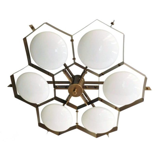 Italian midcentury flush mount with six glossy white Murano glass shades mounted on solid brass frame in bronze finish /...