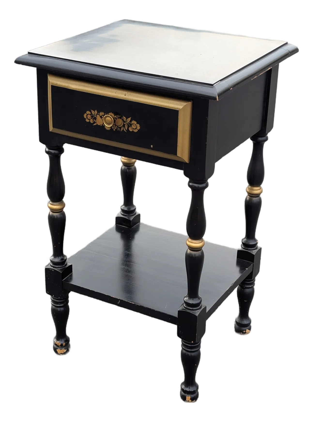 Black French Louis XVI style side table on a white background.