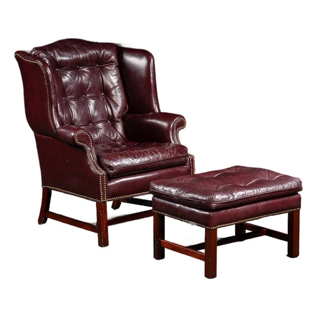 Mid 20th Century Tufted Leather Wingback Chesterfield Armchair With Ottoman in Oxblood For Sale