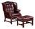 Mid 20th Century Tufted Leather Wingback Chesterfield Armchair With Ottoman in Oxblood For Sale