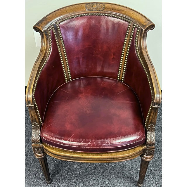 Bring timeless Neoclassical elegance to your workspace or library with this classic Louis XVI style barrel-back desk...