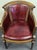 Bring timeless Neoclassical elegance to your workspace or library with this classic Louis XVI style barrel-back desk...