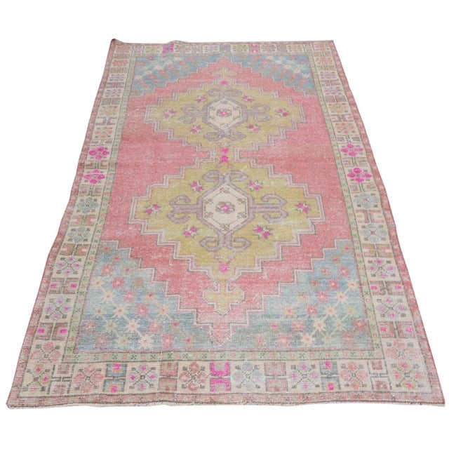 Hand-knotted with care using traditional rug-making techniques, this wool rug blends timeless craftsmanship with a modern...