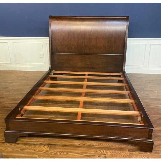 This is a traditional queen size mahogany Sleigh Bed with a low footboard design by Leighton Hall Furniture. It features....