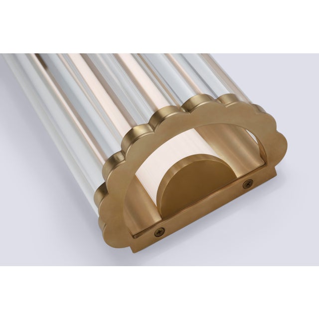 Kean 14" Sconce in Antique-Burnished Brass with Clear Glass Rods Designer: Chapman & Myers Height: 14" Extension: 3.75"...