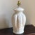 A truly unique and very elegant Palm Beach Regency-style plaster table lamp in the manner of Serge Roche. This lovely...