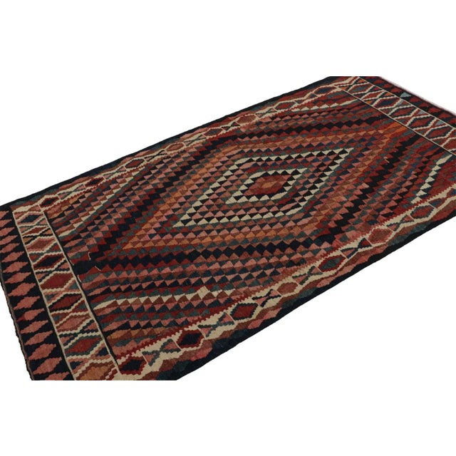 This vintage 4x8 Persian Kilim is a mid-century tribal rug - latest to join our Kilim & Flatweave collection. On the...