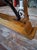 Large polished granite dining table on an oak and wrought iron base This imposing dining table is exquisitely crafted,...