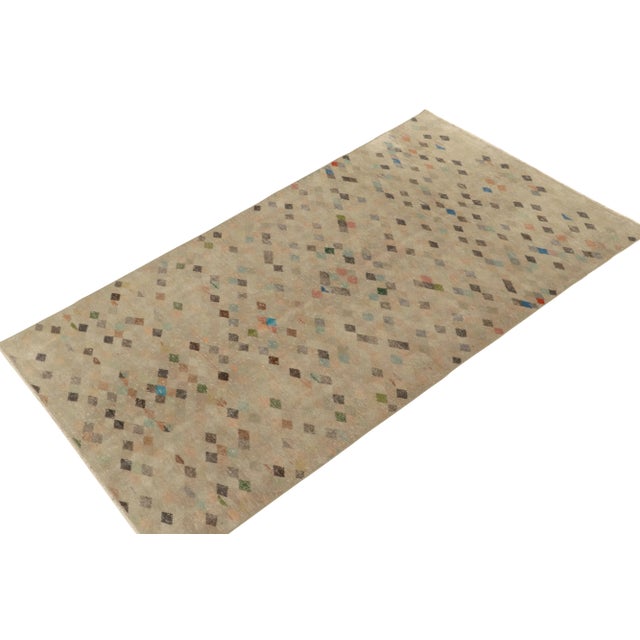 Hand-knotted in wool, a 5x9 vintage rug from a soulful Turkish atelier, entering Rug & Kilim’s commemorative Mid-Century...
