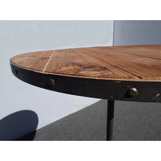 Unique Side Table in Good Vintage Condition. The table top is slightly not flat. Otherwise, Wear is usual for its age....