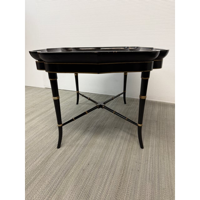 Design Plus Gallery presents an Antique English Regency Floral Painted Tray Table. The focal point for this table is on...