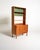 Teak bookcase with sliding doors, adjustable shelves, and an upper section with sliding glass doors. Designed by Bertil...