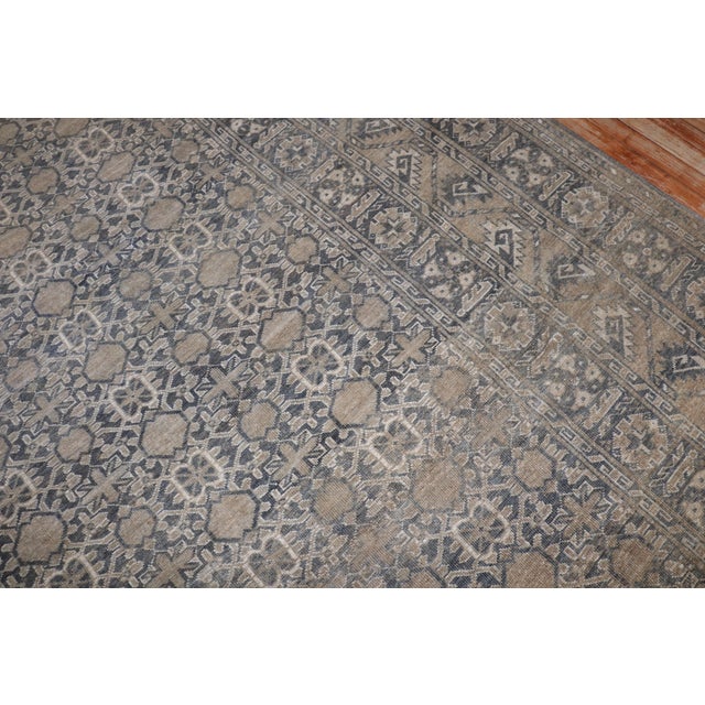 an early 20th century tribal ersari rug in green and brown with a mini khani pattern often found in 19th century caucasian...