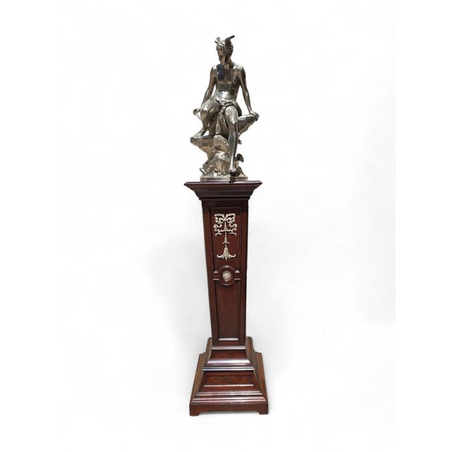 A large mahogany peana from the 19th century, decorated with gilded bronzes, in good state of conservation. This piece is...
