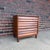 A handsome Mid-Century Modern three-drawer chest from the highly sought-after Wonderwood collection by American of...