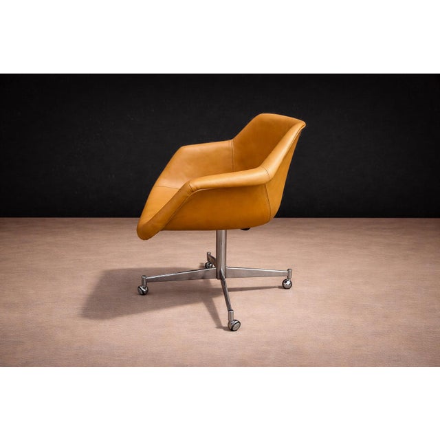 Attributed to Jorge Zalszupin, Brazil, 1960s This office armchair reflects the refined modernism that defined Zalszupin’s...