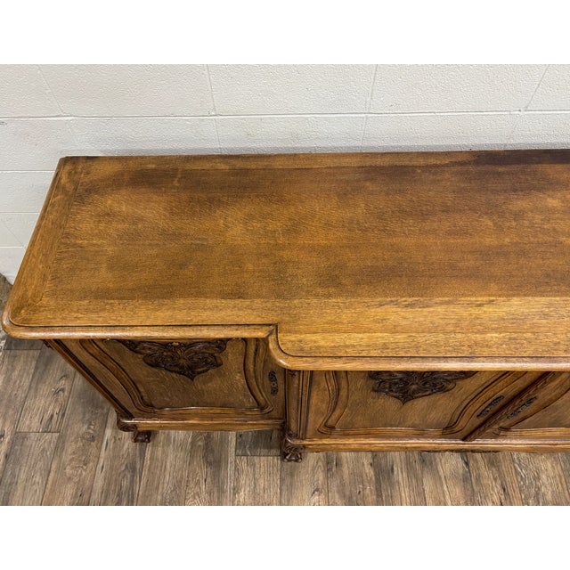 This is a gorgeous antique French Country Louis XIV buffet, sideboard, or server made of what appears to be walnut,...